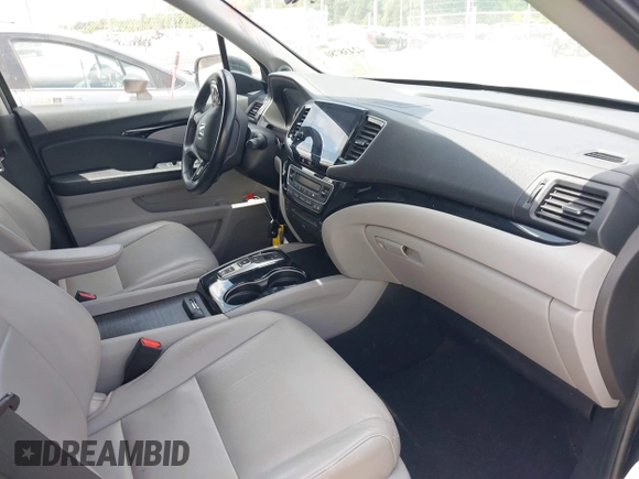 2022 Honda Pilot Touring 7-Passenger with VIN 5FNYF5H61NB019768, listed as a IAAI auction lot 42438780 with Not provided miles and . Bid and sale history available at DreamBid. Image 5.