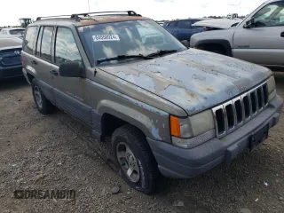 1997 Jeep Grand Cherokee Laredo z VIN 1J4GZ58S4VC502596, wystawiony jako Copart lot #88255865 z przebiegiem Nie podano mil oraz Nie do naprawy • Non repairable. Historia ofert i sprzedaży dostępna na DreamBid. Obrazek 4.