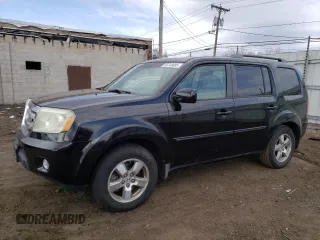 2009 Honda Pilot EX-L with VIN 5FNYF48679B017023, listed as a Copart auction lot 50748695 with 186,273 mi miles and Salvage Title. Bid and sale history available at carsss.com. Image 1.