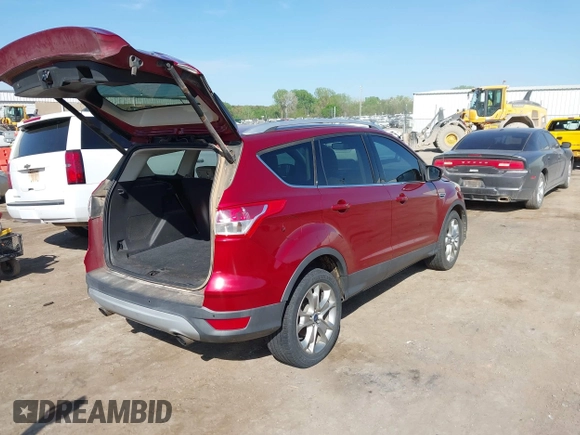 2014 Ford Escape Titanium with VIN 1FMCU0J91EUE12034, listed as a IAAI auction lot 42027493 with 160,417 mi miles and . Bid and sale history available at DreamBid. Image 4.
