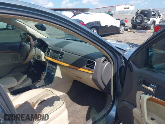 2012 Lincoln MKZ with VIN 3LNHL2GC3CR815296, listed as a IAAI auction lot 42553069 with 212,570 mi miles and . Bid and sale history available at DreamBid. Image 5.