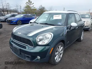2011 MINI Countryman S with VIN WMWZC5C54BWL54135, listed as a IAAI auction lot 42034897 with 130,082 mi miles and . Bid and sale history available at DreamBid. Image 6.