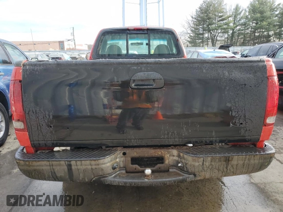 2001 Ford F-150 XL z VIN 3FTZF17291MA72686, wystawiony jako Copart lot #83103904 z przebiegiem 126 018 mil mil oraz Szkoda całkowita • Salvage title. Historia ofert i sprzedaży dostępna na DreamBid. Obrazek 6.