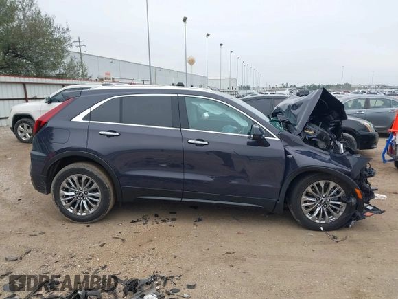 2025 Cadillac XT4 FWD Premium Luxury z VIN 1GYFZCR40SF148814, wystawiony jako IAAI lot #41598124 z przebiegiem Nie podano mil oraz . Historia ofert i sprzedaży dostępna na DreamBid. Obrazek 14.
