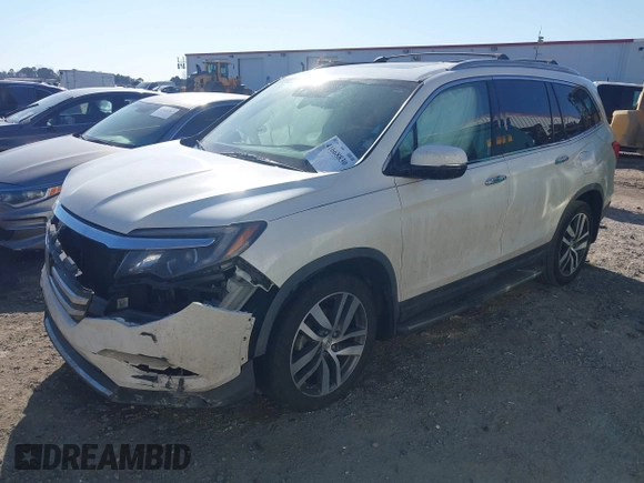 2016 Honda Pilot Elite with VIN 5FNYF6H05GB019292, listed as a IAAI auction lot 41668830 with 170,718 mi miles. Bid and sale history available at carsss.com. Image 18.