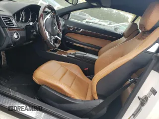2016 Mercedes-Benz E 400 with VIN WDDKK6FF4GF318508, listed as a Copart auction lot 49777505 with 64,369 mi miles and Salvage Title. Bid and sale history available at carsss.com. Image 7.
