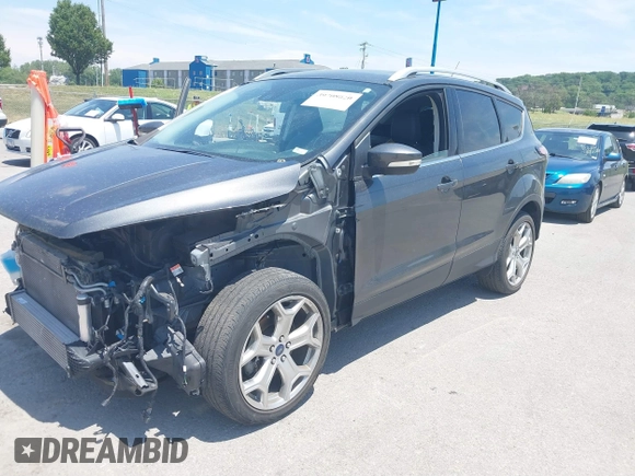 2018 Ford Escape Titanium with VIN 1FMCU9J99JUD43804, listed as a IAAI auction lot 41101250 with 56,438 mi miles and . Bid and sale history available at DreamBid. Image 2.