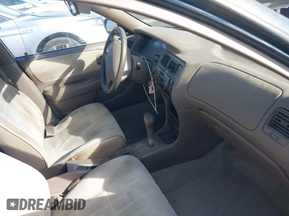 1997 Toyota Corolla with VIN 1NXBA02E5VZ595972, listed as a IAAI auction lot 41622050 with 143,577 mi miles and . Bid and sale history available at DreamBid. Image 5.