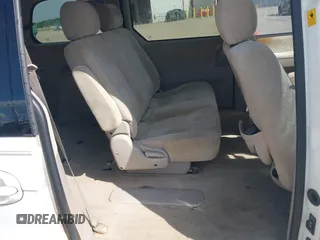 2005 Kia Sedona LX with VIN KNDUP131456634276, listed as a IAAI auction lot 42090209 with 185,754 mi miles and . Bid and sale history available at DreamBid. Image 8.
