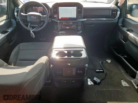 2023 Ford F-150 XL with VIN 1FTEW1CP0PKD18024, listed as a Copart auction lot 64282415 with 96,095 mi miles and Salvage title. Bid and sale history available at DreamBid. Image 8.