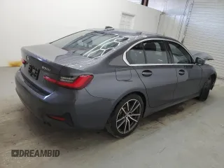 2019 BMW 3 Series 330i with VIN WBA5R1C56KFH04731, listed as a Copart auction lot 56854405 with 99,999 mi miles and Clean title. Bid and sale history available at DreamBid. Image 3.