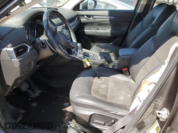 2017 Mazda CX-5 Touring with VIN JM3KFACL1H0100436, listed as a Copart auction lot 53058875 with 77,205 mi miles and Salvage Title. Bid and sale history available at DreamBid. Image 7.
