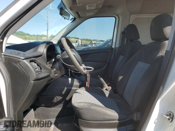 2016 Ram ProMaster City Cargo Tradesman with VIN ZFBERFATXG6B76090, listed as a Copart auction lot 70745034 with 123,982 mi miles and Salvage Title. Bid and sale history available at DreamBid. Image 7.