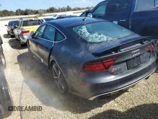 2016 Audi RS 7 Prestige z VIN WUAW2AFC2GN900328, wystawiony jako Copart lot #74450074 z przebiegiem Nie podano mil oraz Nie do naprawy. Historia ofert i sprzedaży dostępna na DreamBid. Obrazek 2.