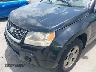 2009 Suzuki Grand Vitara z VIN JS3TE042894100428, wystawiony jako IAAI lot #42476230 z przebiegiem 151 799 mil mil oraz . Historia ofert i sprzedaży dostępna na DreamBid. Obrazek 13.