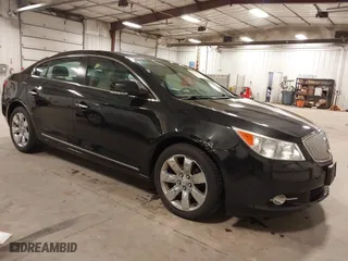2012 Buick LaCrosse Premium 1 with VIN 1G4GD5E3XCF136619, listed as a IAAI auction lot 41933336 with 140,401 mi miles. Bid and sale history available at carsss.com. Image 1.