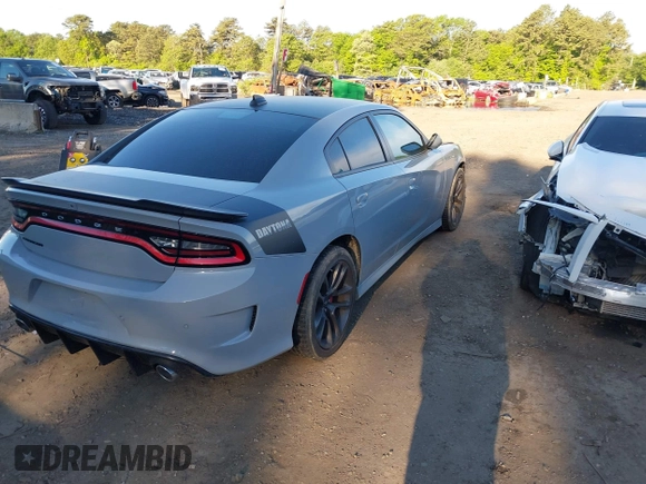2021 Dodge Charger R/T with VIN 2C3CDXCT8MH594715, listed as a IAAI auction lot 42257288 with 11,570 mi miles and . Bid and sale history available at DreamBid. Image 4.