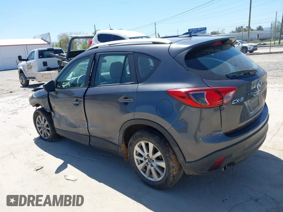 2016 Mazda CX-5 Sport with VIN JM3KE2BY2G0781565, listed as a IAAI auction lot 42042256 with 182,186 mi miles. Bid and sale history available at carsss.com. Image 3.
