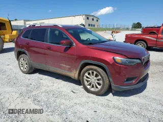 2019 Jeep Cherokee Latitude with VIN 1C4PJLCB7KD205885, listed as a Copart auction lot 58077555 with 188,034 mi miles and Salvage title. Bid and sale history available at DreamBid. Image 4.