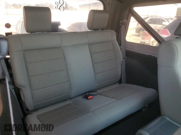 2009 Jeep Wrangler Sahara with VIN 1J4FA54119L747068, listed as a Copart auction lot 71209904 with 86,978 mi miles and Salvage title. Bid and sale history available at DreamBid. Image 11.