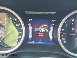 2014 Maserati Ghibli with VIN ZAM57XSA9E1082923, listed as a IAAI auction lot 41110273 with 91,551 mi miles. Bid and sale history available at carsss.com. Image 7.