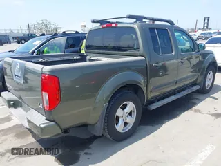 2005 Nissan Frontier LE with VIN 1N6AD07U05C449750, listed as a IAAI auction lot 42658701 with 104,630 mi miles and . Bid and sale history available at DreamBid. Image 4.