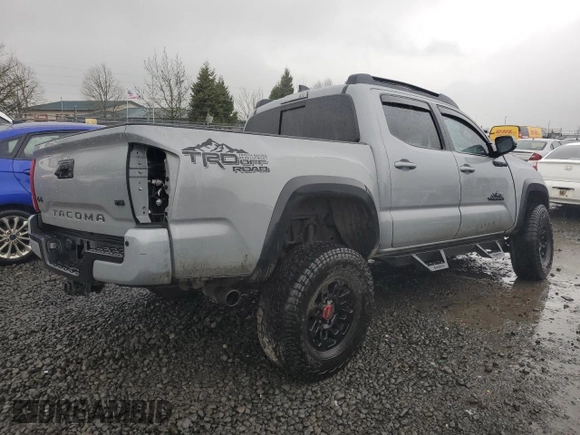 2021 Toyota Tacoma SR with VIN 3TMCZ5AN0MM395357, listed as a Copart auction lot 87086684 with 48,664 mi miles and Salvage title. Bid and sale history available at DreamBid. Image 3.