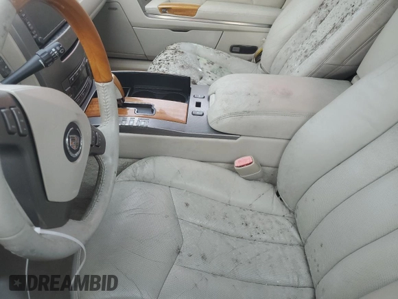 2005 Cadillac XLR z VIN 1G6YV34A955600425, wystawiony jako Copart lot #76188034 z przebiegiem Nie podano mil oraz Szkody całkowita. Historia ofert i sprzedaży dostępna na DreamBid. Obrazek 7.
