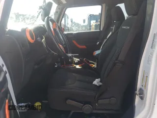 2014 Jeep Wrangler Unlimited Rubicon with VIN 1C4BJWFG4EL325544, listed as a Copart auction lot 61966025 with 149,162 mi miles and Salvage title. Bid and sale history available at DreamBid. Image 7.