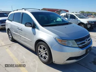 2012 Honda Odyssey EX with VIN 5FNRL5H48CB131881, listed as a IAAI auction lot 41822159 with 354,718 mi miles and . Bid and sale history available at carsss.com. Image 1.