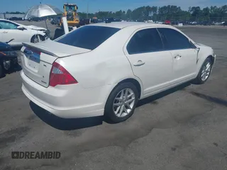 2012 Ford Fusion SEL z VIN 3FAHP0JG1CR167326, wystawiony jako IAAI lot #42320109 z przebiegiem 117 381 mil mil oraz . Historia ofert i sprzedaży dostępna na DreamBid. Obrazek 4.