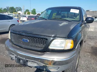2003 Ford F-150 XLT with VIN 1FTRW08L63KC51053, listed as a IAAI auction lot 42538965 with 167,383 mi miles and . Bid and sale history available at DreamBid. Image 6.