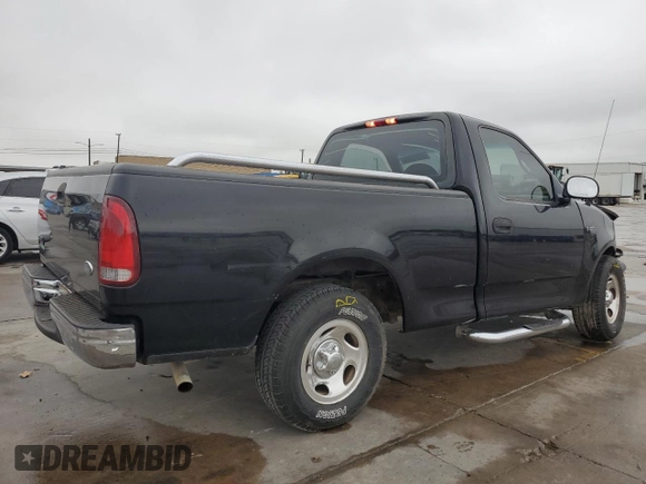 2000 Ford F-150 XL with VIN 3FTZF1728YMA63732, listed as a Copart auction lot 80010344 with Not provided miles and Salvage title. Bid and sale history available at DreamBid. Image 3.