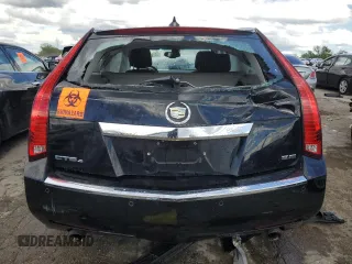 2014 Cadillac CTS with VIN 1G6DH8E3XE0134312, listed as a Copart auction lot 61556874 with 77,194 mi miles and Salvage Title. Bid and sale history available at DreamBid. Image 6.