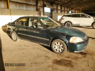 1997 Honda Civic DX with VIN JHMEJ6623VS028089, listed as a Copart auction lot 78659644 with 194,593 mi miles and Salvage Title. Bid and sale history available at DreamBid. Image 4.