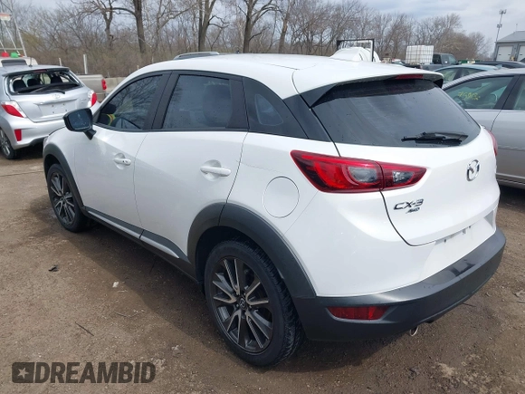 2016 Mazda CX-3 Grand Touring with VIN JM1DKFD73G0129737, listed as a IAAI auction lot 41875808 with 120,547 mi miles. Bid and sale history available at carsss.com. Image 3.