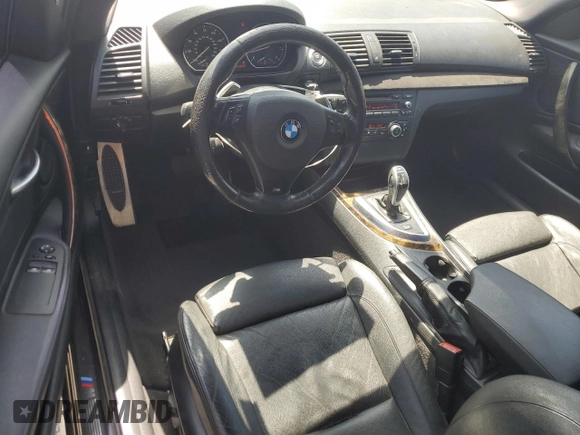 2011 BMW 1 Series 135i with VIN WBAUC9C59BVM10528, listed as a Copart auction lot 61499025 with 160,557 mi miles and Salvage title. Bid and sale history available at DreamBid. Image 8.