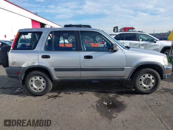 2000 Honda CR-V LX with VIN JHLRD184XYC054038, listed as a IAAI auction lot 41414445 with 294,210 mi miles. Bid and sale history available at carsss.com. Image 13.