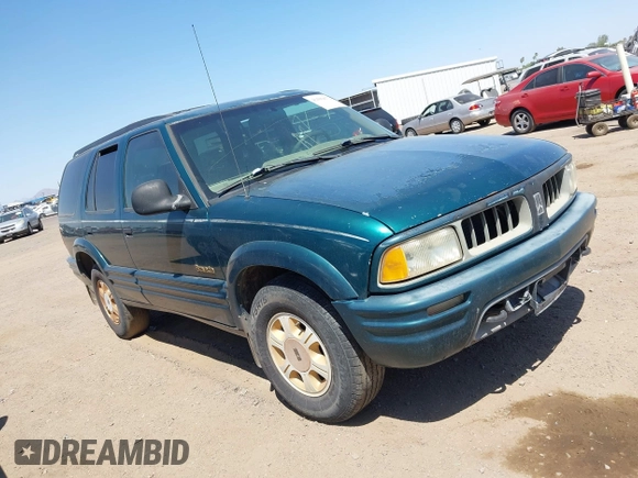 1996 Oldsmobile Bravada z VIN 1GHDT13W5T2711291, wystawiony jako IAAI lot #42502672 z przebiegiem 219 062 mil mil oraz . Historia ofert i sprzedaży dostępna na DreamBid. Obrazek 1.