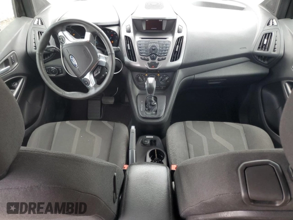 2017 Ford Transit Connect XLT with VIN NM0LS7F79H1324491, listed as a Copart auction lot 60055345 with 128,463 mi miles and Salvage title. Bid and sale history available at DreamBid. Image 8.