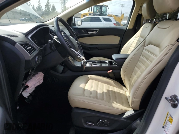 2019 Ford Edge SEL with VIN 2FMPK3J95KBB97431, listed as a Copart auction lot 58790065 with 72,357 mi miles and Salvage title. Bid and sale history available at DreamBid. Image 7.