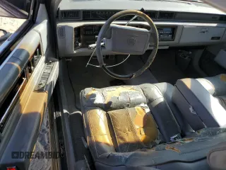 1990 Cadillac DeVille z VIN 1G6CD1339L4358825, wystawiony jako Copart lot #76901884 z przebiegiem 169 956 mil mil oraz Szkoda całkowita • Salvage title. Historia ofert i sprzedaży dostępna na DreamBid. Obrazek 8.
