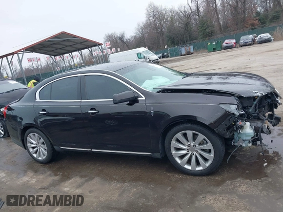 2014 Lincoln MKS with VIN 1LNHL9EK7EG609329, listed as a IAAI auction lot 41555819 with 89,849 mi miles. Bid and sale history available at carsss.com. Image 13.