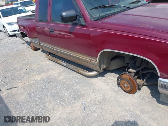 1994 GMC Sierra 1500 z VIN 2GTEK19K4R1561409, wystawiony jako IAAI lot #41903157 z przebiegiem 416 719 mil mil oraz . Historia ofert i sprzedaży dostępna na DreamBid. Obrazek 14.