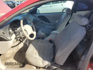 1998 Ford Mustang z VIN 1FAFP4044WF142556, wystawiony jako Copart lot #51642505 z przebiegiem 146 962 mil mil oraz Szkoda całkowita • Salvage title. Historia ofert i sprzedaży dostępna na DreamBid. Obrazek 7.