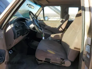 1993 Ford F-150 with VIN 1FTEX14Y1PKA34020, listed as a Copart auction lot 85978374 with 238,895 mi miles and Salvage Title. Bid and sale history available at carsss.com. Image 7.
