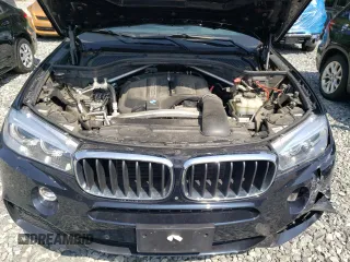2017 BMW X5 xDrive35i with VIN 5UXKR0C37H0X80867, listed as a Copart auction lot 58697515 with 54,191 mi miles and Salvage title. Bid and sale history available at DreamBid. Image 12.