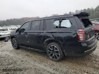 2021 Chevrolet Suburban RST with VIN 1GNSKEKD4MR210450, listed as a Copart auction lot 84372054 with 98,560 mi miles and Salvage Title. Bid and sale history available at carsss.com. Image 2.