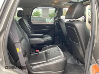 2007 Chevrolet Tahoe LTZ z VIN 1GNFK13007R118200, wystawiony jako Copart lot #61613185 z przebiegiem 137 294 mil mil oraz Czysty tytuł • Clean title. Historia ofert i sprzedaży dostępna na DreamBid. Obrazek 6.