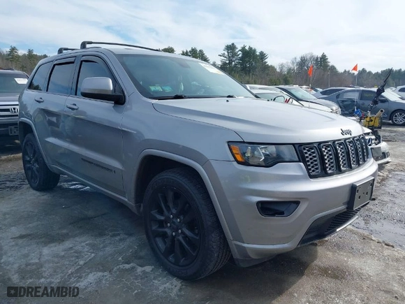 2018 Jeep Grand Cherokee Laredo E with VIN 1C4RJFAG1JC487082, listed as a IAAI auction lot 41663081 with 136,853 mi miles. Bid and sale history available at carsss.com. Image 1.